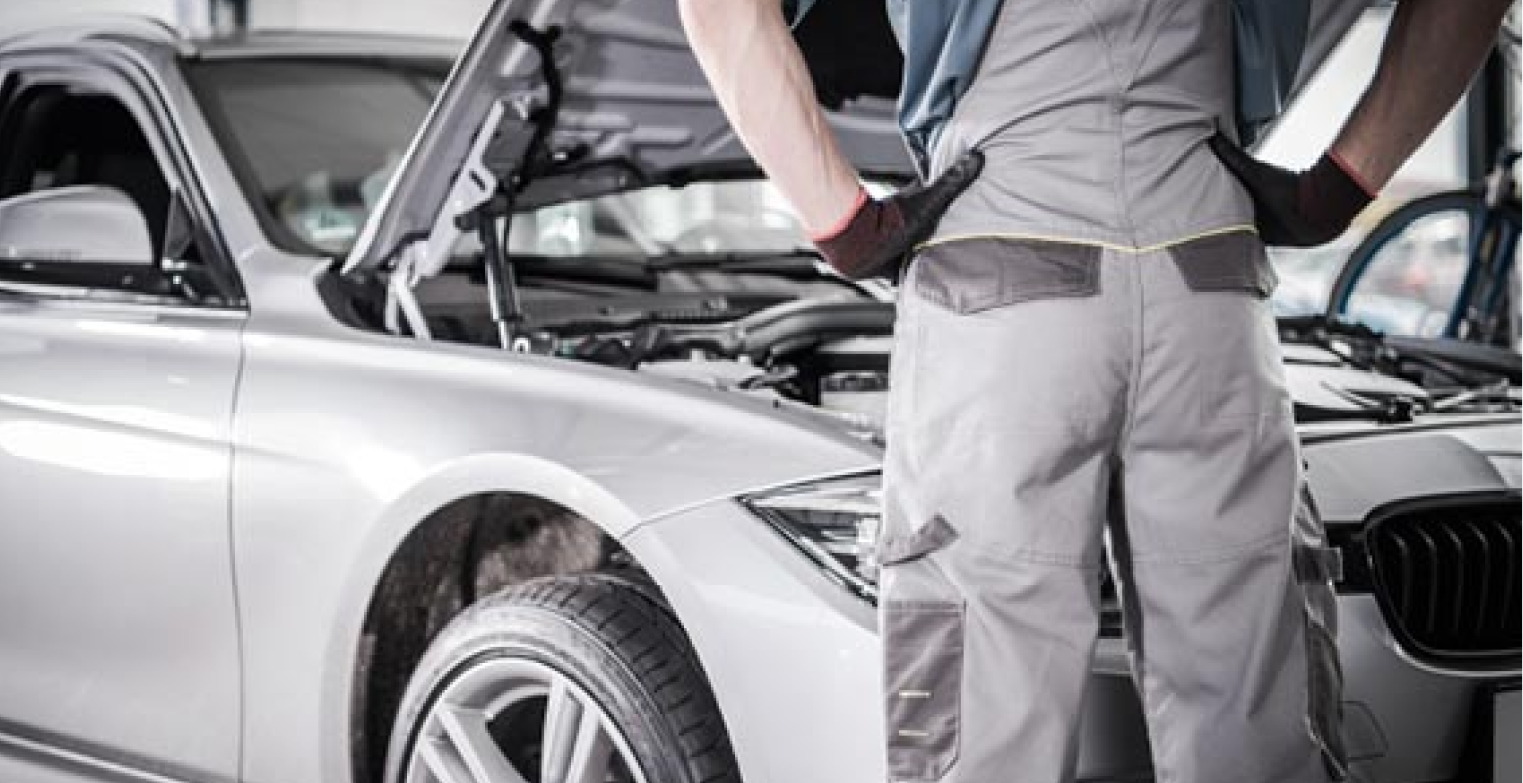 Car Mechanic working on the car